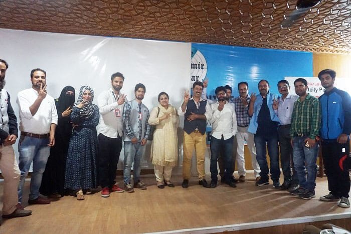 Team members of 'The Kashmir Radar' stand for a photograph along with guests during news portal's launch event Team members of 'The Kashmir Radar' stand for a photograph along with guests during news portal's launch event