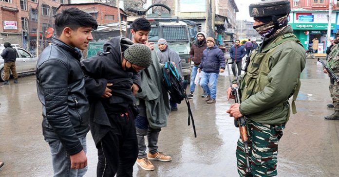 Government forces frisking people in Lal Chowk Srinagar