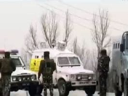 Government forces stand guard at Awantipora IED blast site