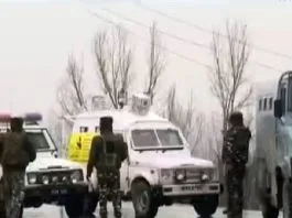 Government forces stand guard at Awantipora IED blast site