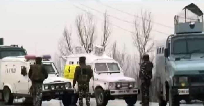 Government forces stand guard at Awantipora IED blast site