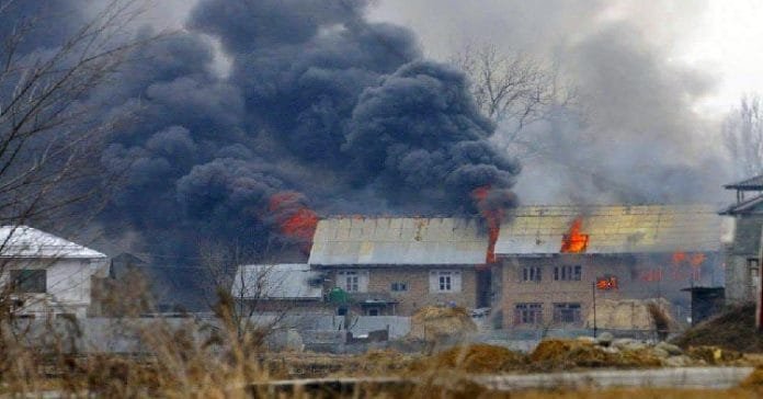 Residential houses caught fire during the fierce gunfight in Pinglena village of Pulwama