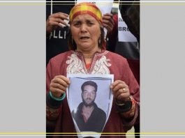 Family of missing Pattan driver protests in Srinagar