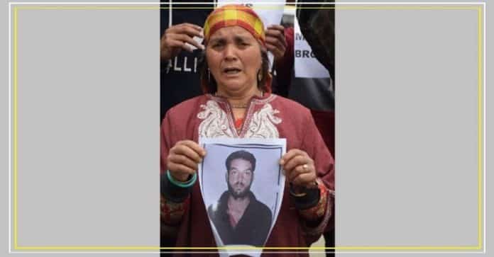Family of missing Pattan driver protests in Srinagar