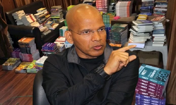 Basant Rath distributing free books to students Basant Rath distributing free books to students