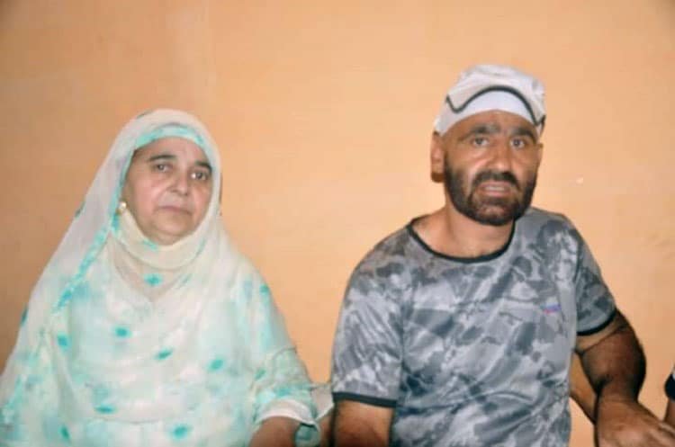 Lateef Ahmad with his mother