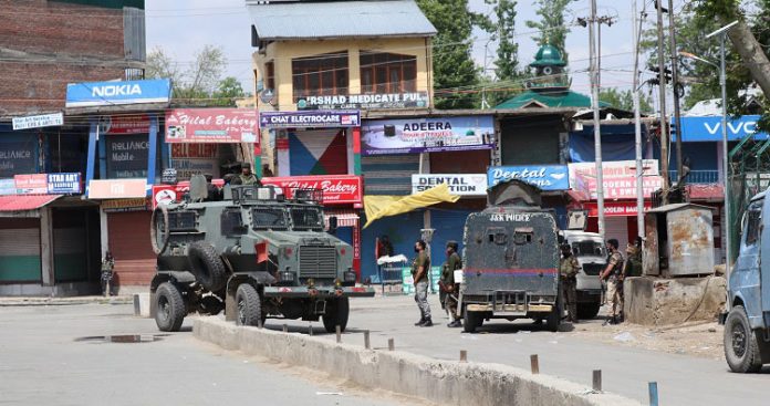 Government forces lay siege during a gunfight in Pulwama