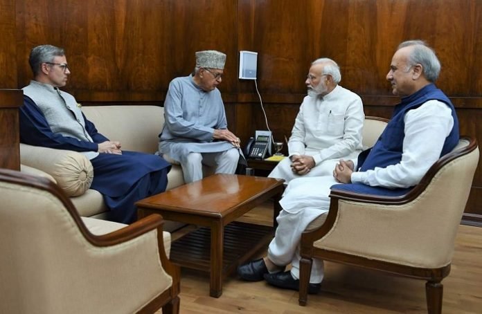 Farooq Abdullah, Omar Abdullah, Hasnain Masoodi & Narendra Modi in a meeting Farooq Abdullah, Omar Abdullah, Hasnain Masoodi & Narendra Modi in a meeting