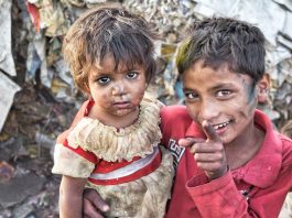 India - Slums - Poor - Brother Sister