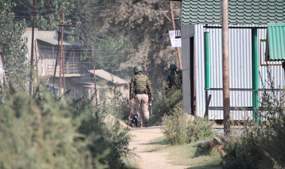 A policeman captured by Reshi Irshad after beating the journalists in Pulwama