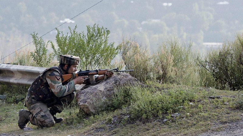 Indian Army soldier takes position along LoC in J&K