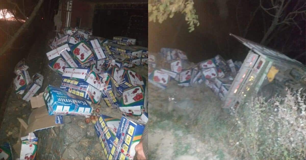 Vehicle laden with Apple boxes overturns at Aglar Kandi in Pulwama