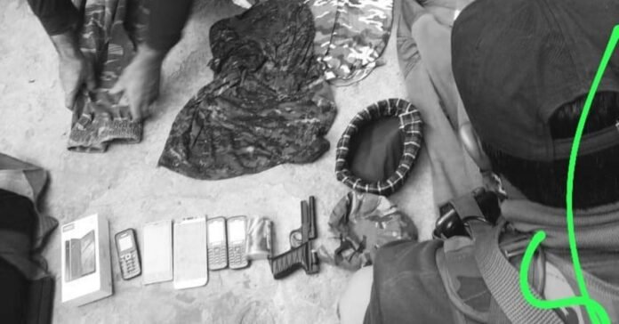 Toy pistol, cell phones, military uniforms recovered from suspects in Tral