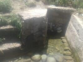 Spring in Zadoora village of Pulwama from which locals fetch drinking water