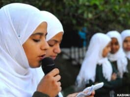 Kashmiri girl students during morning assembly in a school