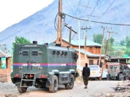 Vehicle of J-K Police near a gunfight site in Kashmir