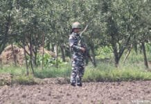 Gunfight underway between security forces and militants in Kishtwar A CRPF man stand guard during a gunfight in south Kashmir
