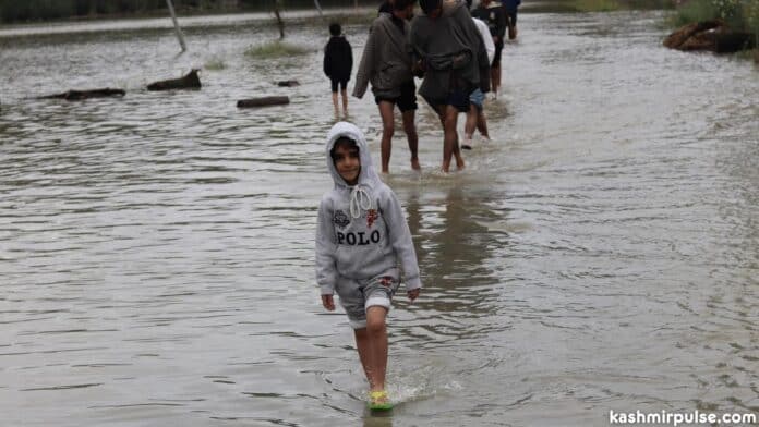 Flood-water after incessant rainfall in Pinglena village of Pulwama