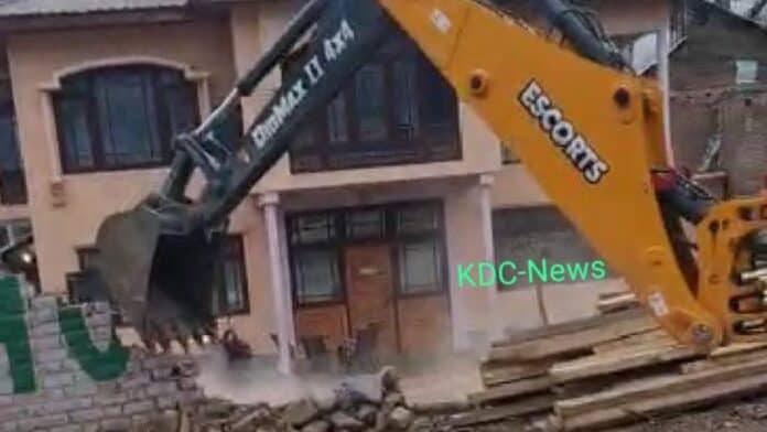 Encroached land by member of United Jihad Council removed in Anantnag