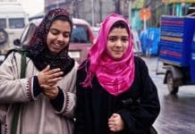 3,997 schools merged or clubbed in 2022-23: J&K Govt Kashmiri school girls walk on a busy road in Srinagar