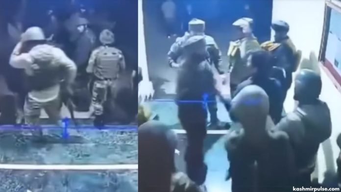 A group of armed personnel from the 160 Territorial Army storming the Police Station Kupwara