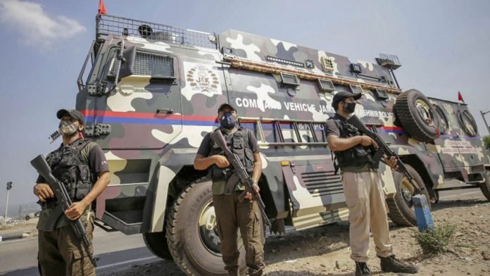 Crisis Response Team (CRT) stand near command vehicle of J&K Police in Jammu Crisis Response Team (CRT) stand near command vehicle of J&K Police in Jammu