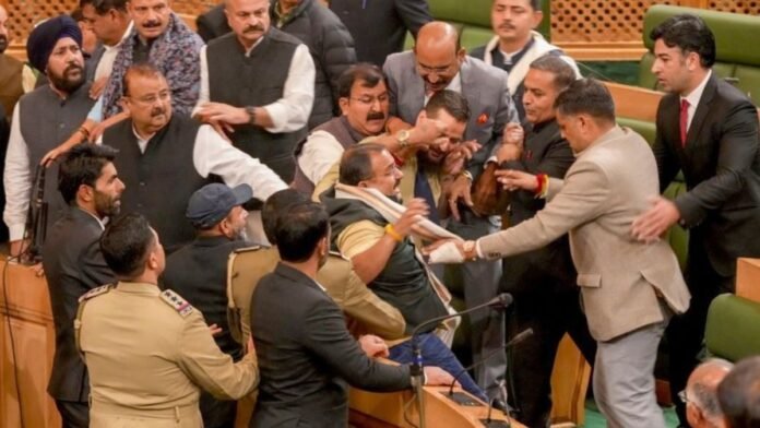 Ruckus in the Jammu and Kashmir Assembly after the Speaker directed eviction of opposition members Ruckus in the Jammu and Kashmir Assembly after the Speaker directed eviction of opposition members