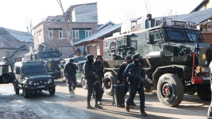 Security personnel cordon off Behibagh area in Kulgam following militant attack on retired Indian Army soldier