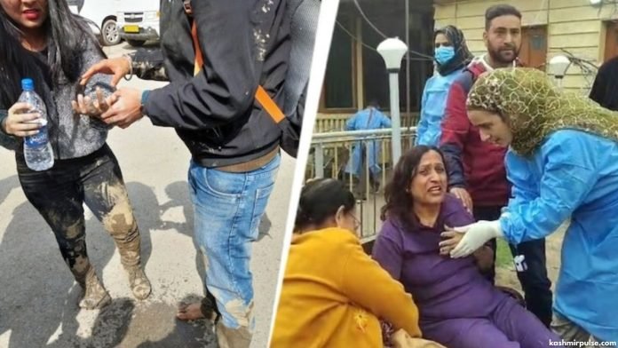 Tourists being helped after gunmen attack in Baisaran Pahalgam Tourists being helped after gunmen attack in Baisaran Pahalgam