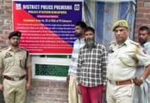 Pulwama Police attach residential property of alleged drug peddler Pulwama Police attach residential property of alleged drug peddler in Karnabal Samboora