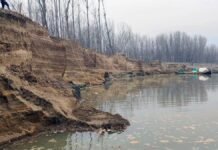 Illegal sand mining alleged near Flood Control office in Pampore Damage to protective embankments due to illegal sand mining in Pampore