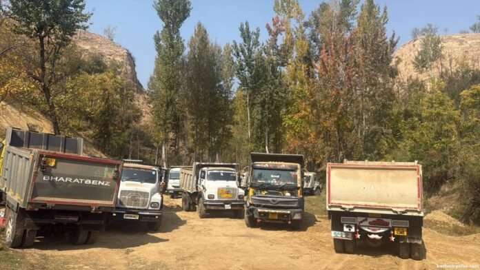 Pulwama Police seize 20 dumpers, L&T excavator in illegal soil extraction raid Pulwama Police seize 20 dumpers, L&T excavator in illegal soil extraction raid